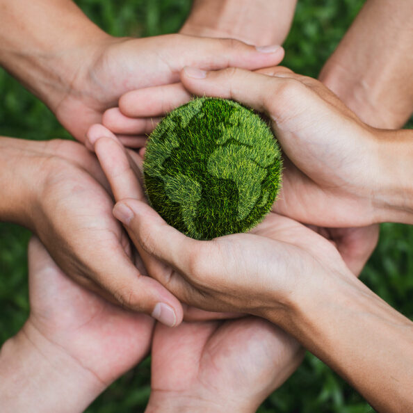 Earth Day. Hands adult Teamwork harmony Holding earth on hands. Environmental and reduce global warming help earth, top view. ecology and environment sustainable concept..