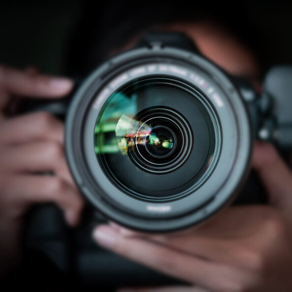 photographer take pictures Snapshot with camera. man hand holdi